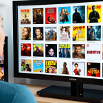 **

A user looking at personalized recommendations on a streaming service, surrounded by movie posters and TV show thumbnails. The scene highlights the feeling of discovery and the system's understanding of their taste. Focus on capturing the excitement of finding new favorites through interaction analysis.

**